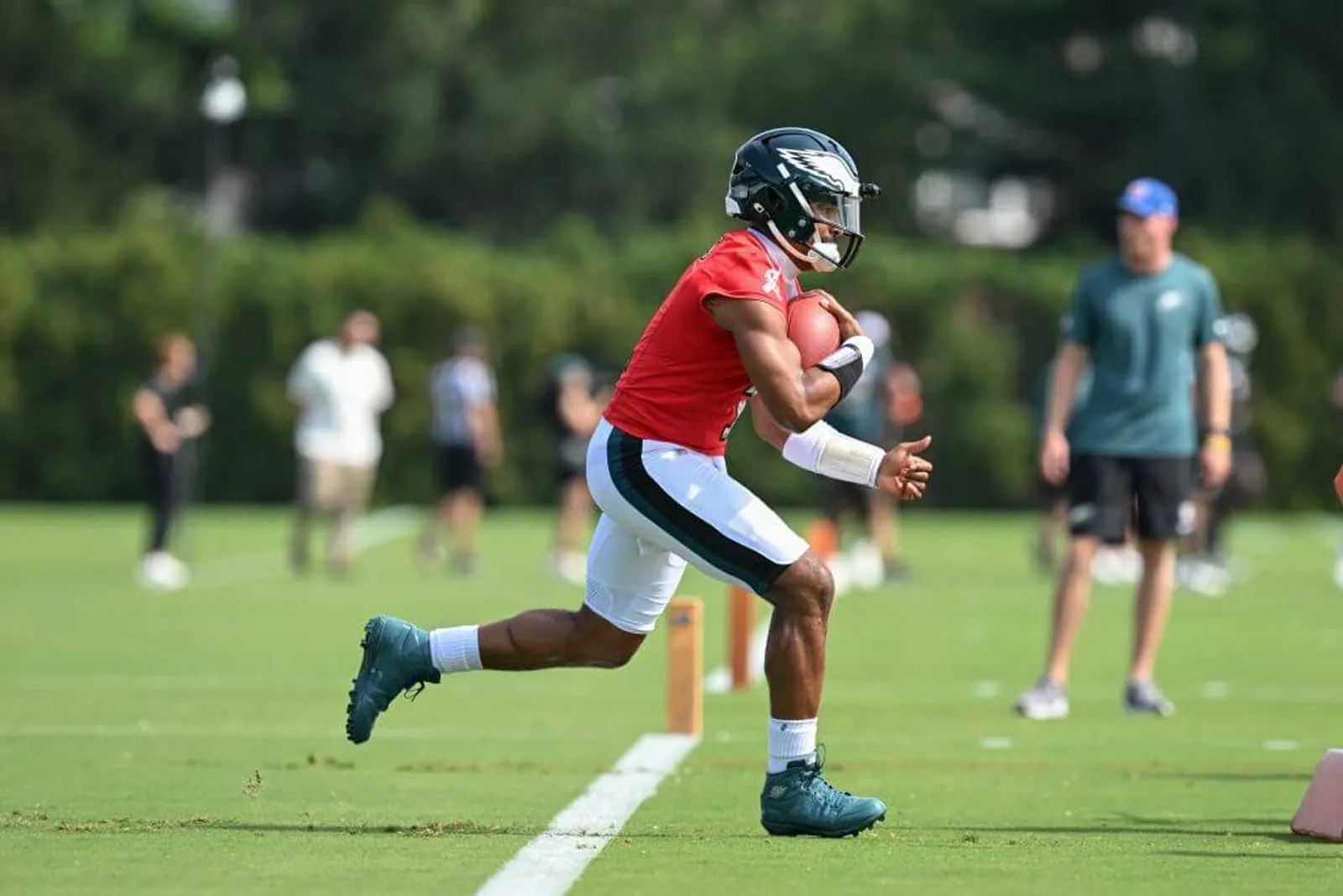 Philadelphia Eagles quarterback Jalen Hurts runs a drill during training camp at Jefferson Health Training Complex.