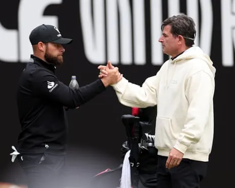 The LIV Golf chief executive, Scott O'Neil, interacts with Tyrrell Hatton during day four of LIV Golf United Kingdom