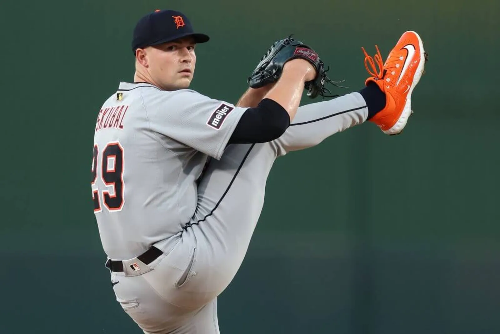 Tarik Skubal kicks up his right leg as he gets set to deliver a pitch.